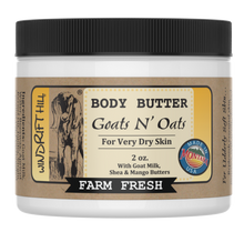 Load image into Gallery viewer, Close-up of Goats N' Oats goat milk body butter travel jar.