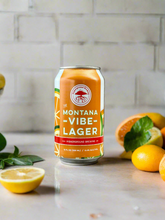 Load image into Gallery viewer, Montana Vibe Lager - By: Higherground Brewing Co.
