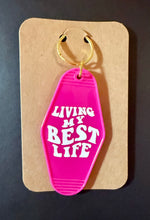 Load image into Gallery viewer, Pink keychain with 'Living My Best Life' 
