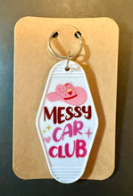 Load image into Gallery viewer, Keychain with 'Messy Car Club' text and pink cowboy hat design.
