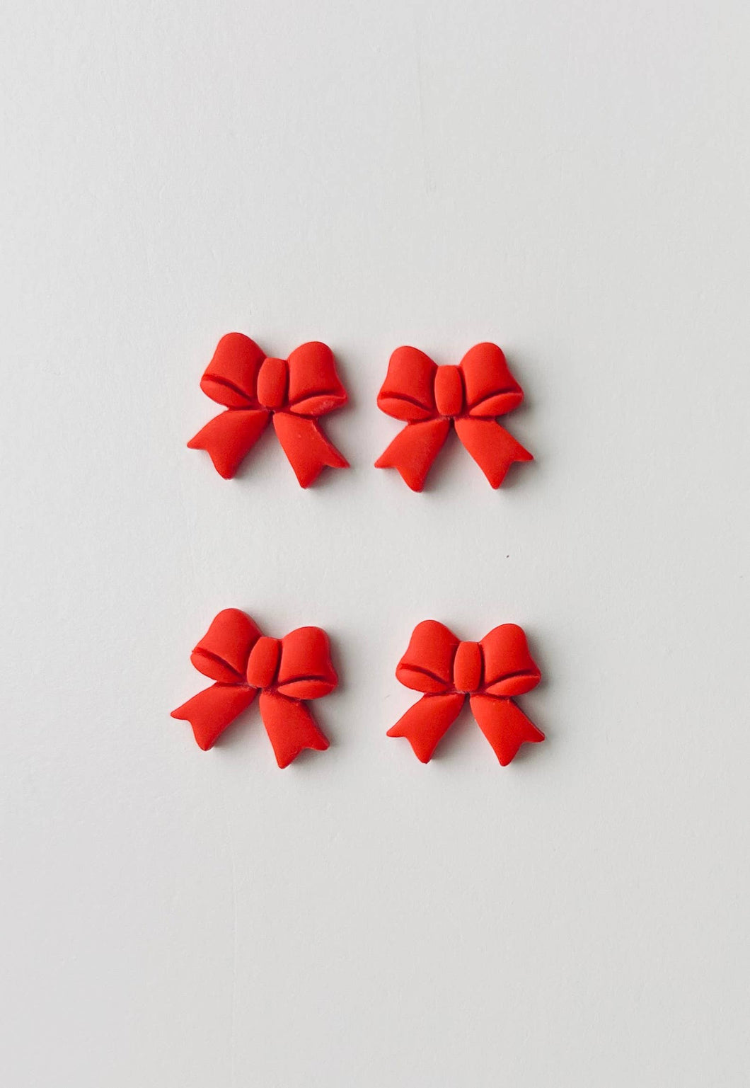 Red Bow Clay Earrings, Handmade Studs - By: La Petite Rose
